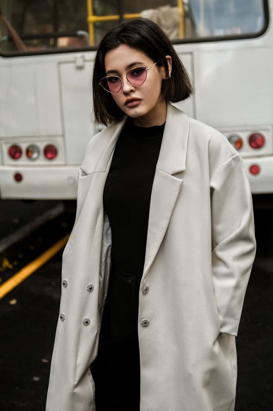 women with sunglasses and jacket